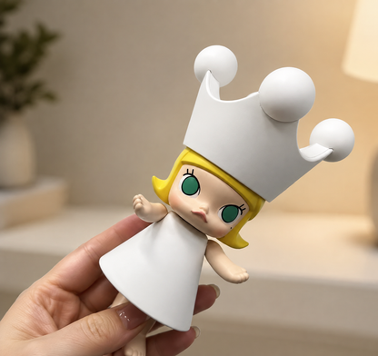 Hand holding the POP MART MEGA Royal MOLLY 150% paint-your-own figure, showing its large white crown and size for scale.