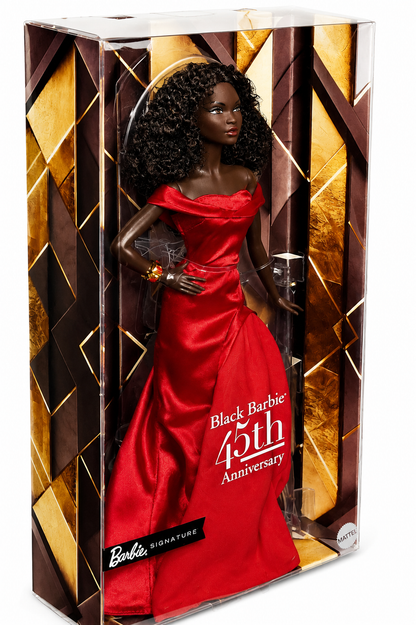 Black Barbie 45th Anniversary JBJ22 Barbie Signature doll shown in original collector packaging from an angled side view, wearing a red satin gown with gold accessories.