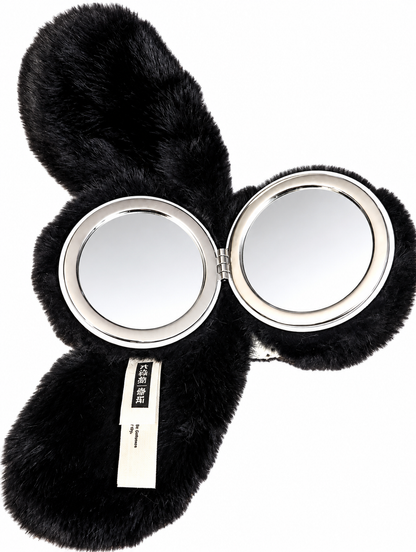 Baby Three Vanity Mirror V2 Black Bunny opened to reveal two circular silver-framed mirrors surrounded by soft black plush fur.