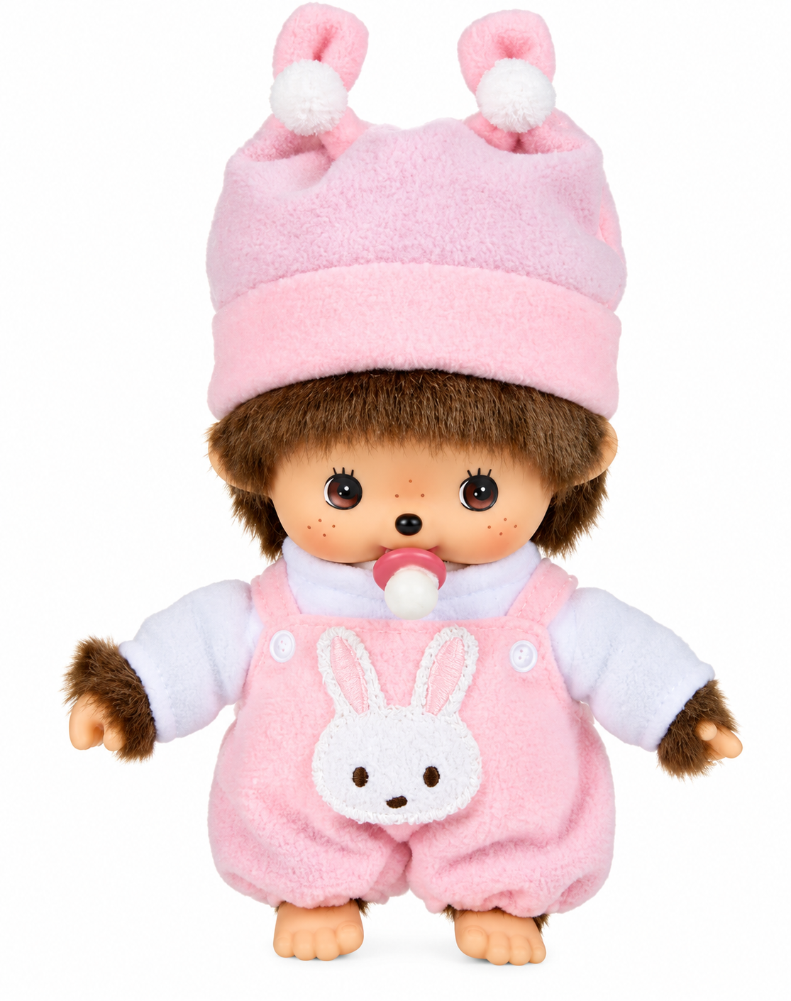 Sekiguchi Monchhichi Bebichhichi Revival Pink Bunny Girl plush doll wearing pastel pink bunny overalls and matching hat with white pom-poms.