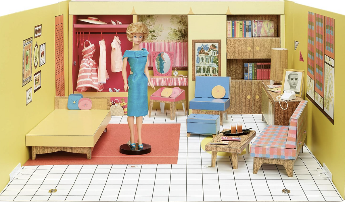Mattel Barbie 1962 Dream House reproduction GNC38 displayed with Bubblecut Barbie doll, furniture, wardrobe and accessories