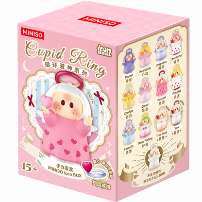 MINISO YOYO Cupid Ring Collection pink mystery blind box featuring an adorable cupid character holding a heart, with the collectible character lineup displayed on the side.
