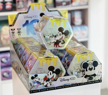 Potdemiel Disney 100 Mickey & Friends Retro Revival Series holographic hexagonal collectible box featuring Mickey Mouse artwork and official Disney authenticity sticker.
