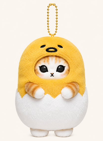 Mofusand ginger cat plush keychain wearing a cream and brown gudetama sanrio animal character costume