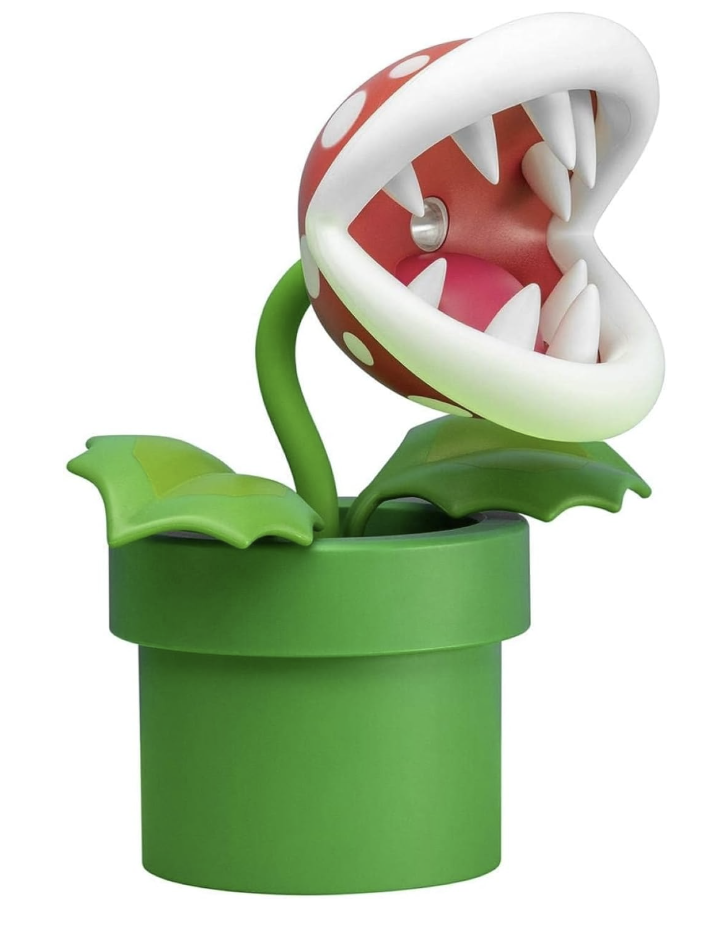 Super Mario Piranha Plant posable LED lamp by Paladone featuring an open red and white mouth, sharp teeth, green leaves and iconic green pipe.