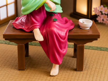 Maomao PVC figure detail showing pink skirt, bare feet, wooden bench and miniature mortar