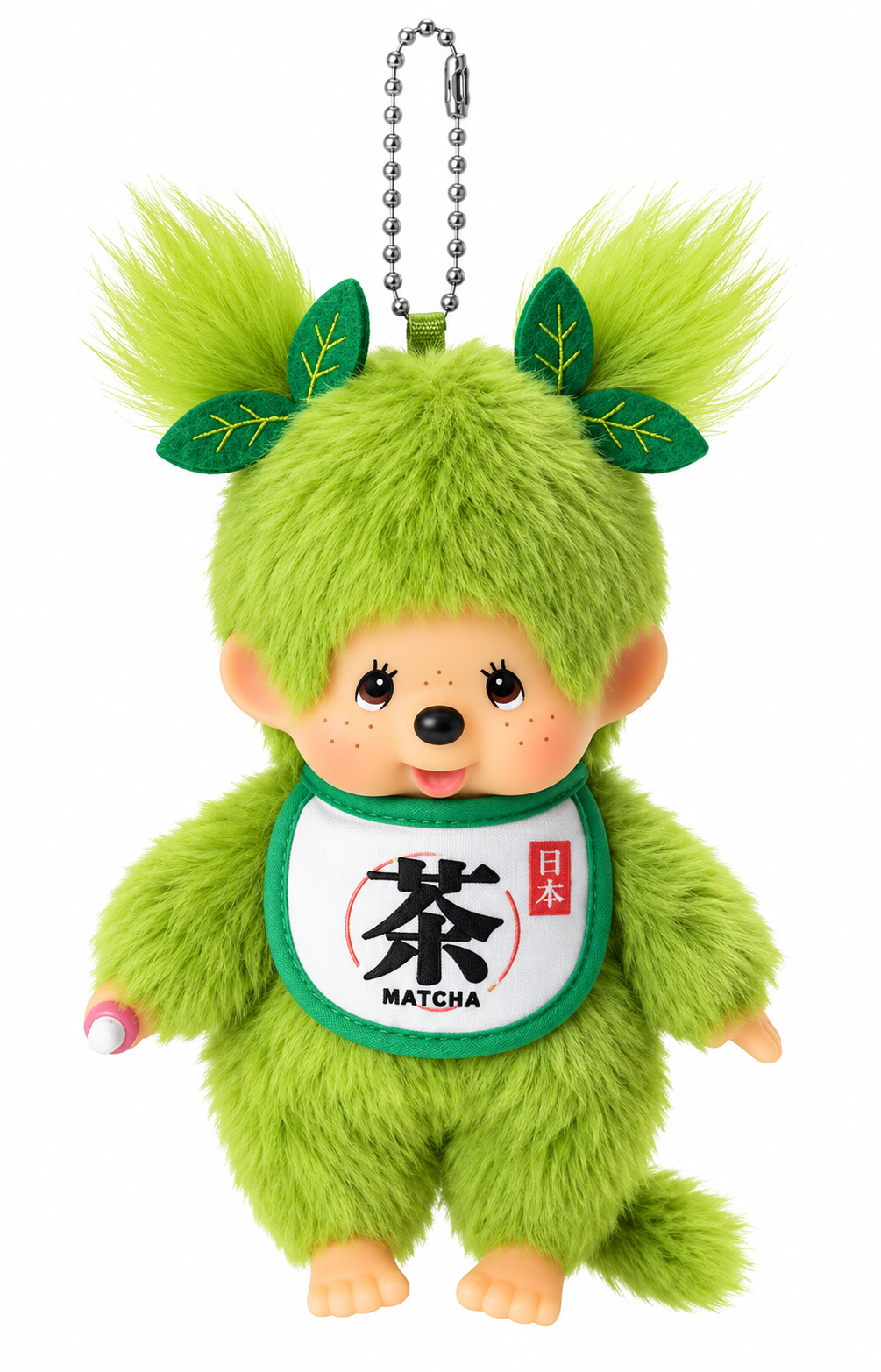 Monchhichi Matcha Girl plush keychain by Sekiguchi Japan featuring bright green fur, leafy pigtails and Japanese matcha bib.