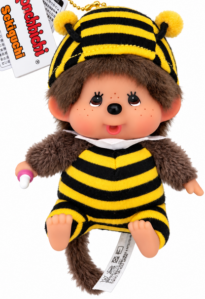 Front view of Monchhichi Honey Bee plush keychain featuring a smiling face, soft brown fur and yellow and black bumblebee outfit.