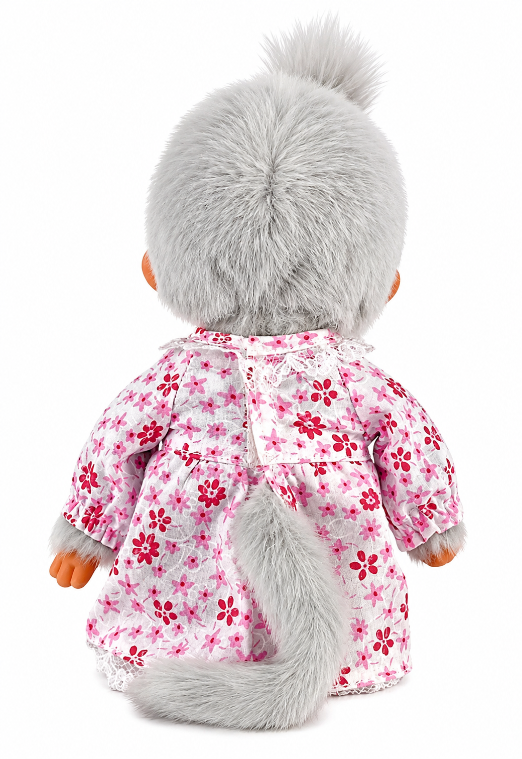 Full-length Sekiguchi Monchhichi Grandma plush doll in pink floral dress and white lace apron