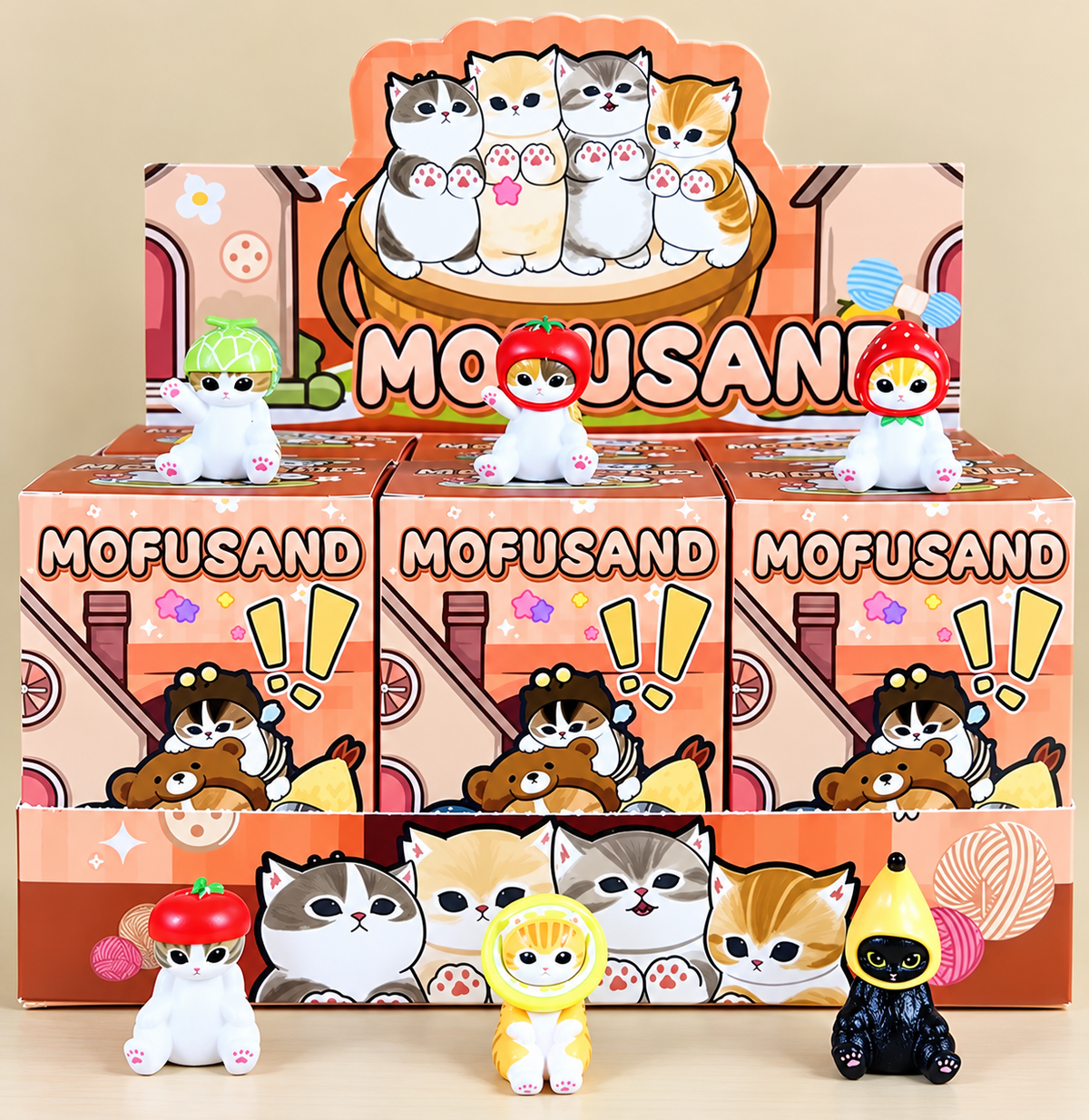 Mofusand Fruit Costume mystery blind boxes displayed with adorable miniature cat figures wearing colourful strawberry, tomato, melon and banana-inspired outfits.