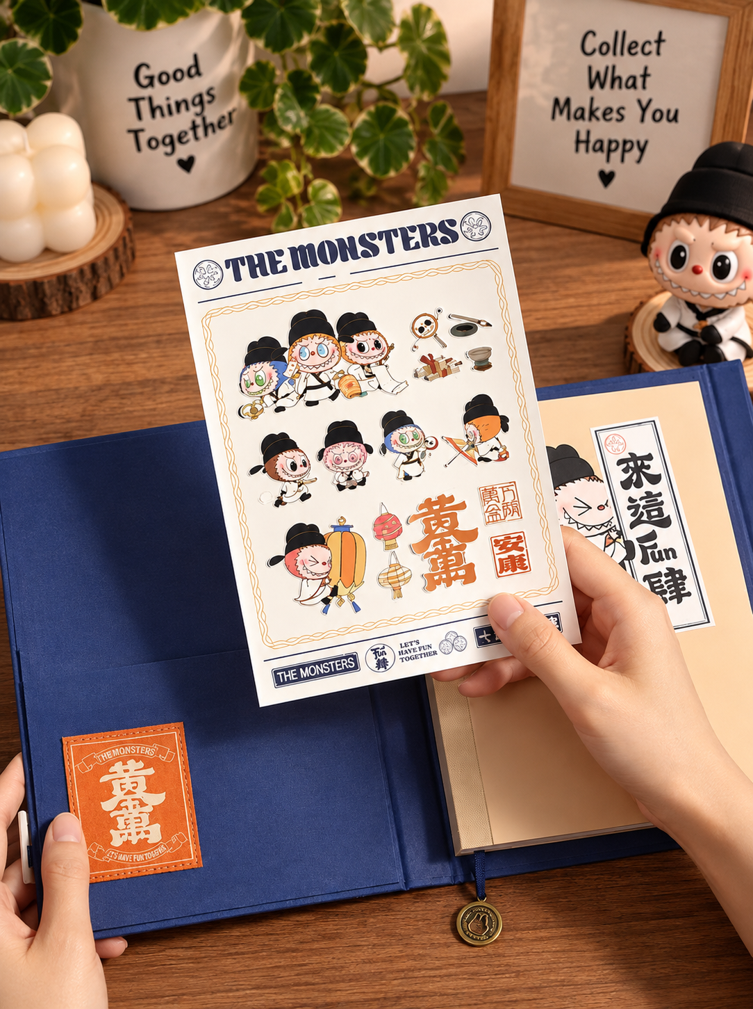 POP MART The Monsters Let’s Have Fun Together notebook open with Labubu character sticker sheet