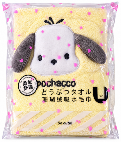 Soft yellow Sanrio Pochacco towel with embroidered character face, presented in original sealed packaging decorated with pink hearts.