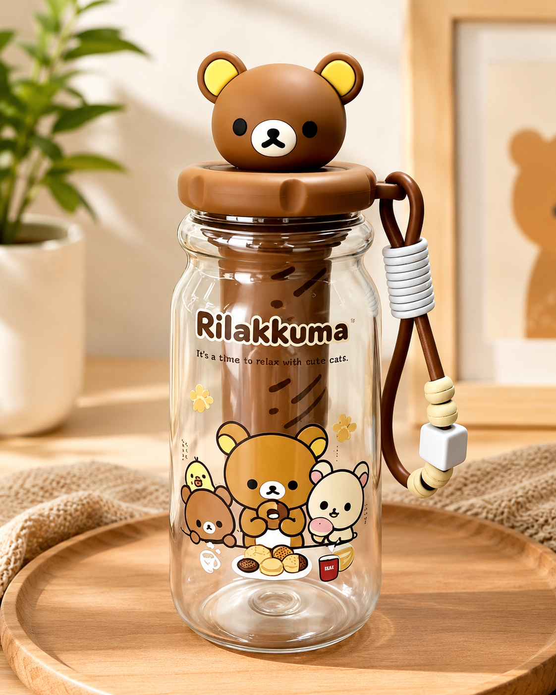 Rilakkuma clear infuser drinks bottle with brown 3D bear head lid, internal filter, decorative wrist strap and character artwork