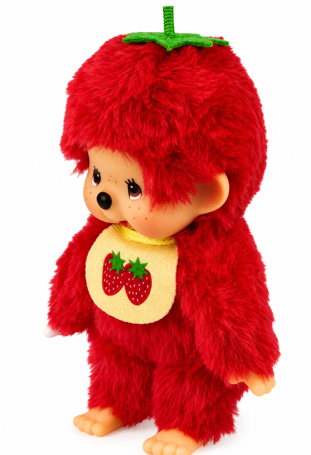 Sekiguchi Monchhichi Fruit Color Strawberry Red plush shown at an angle with red fluffy fur and strawberry bib