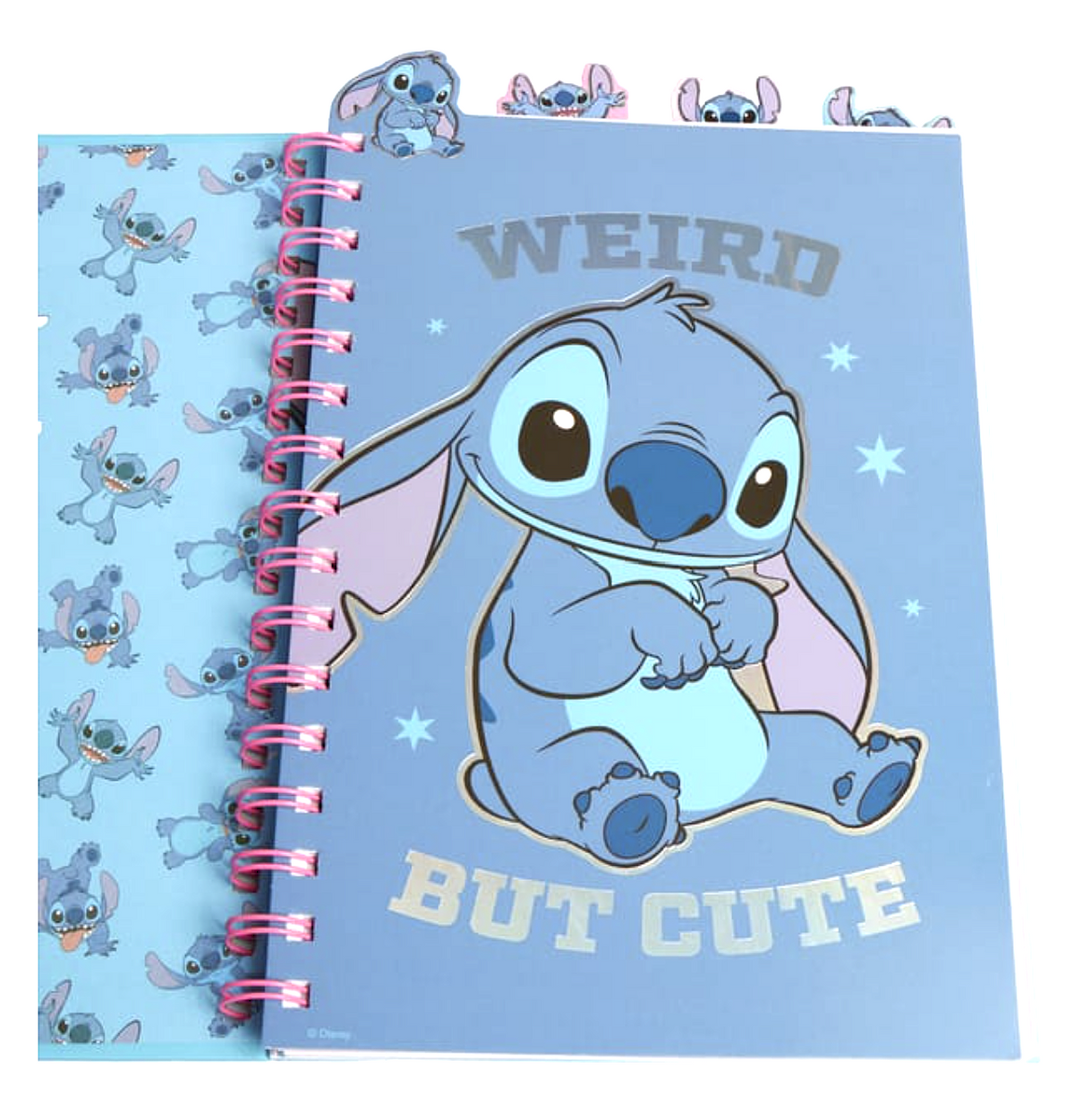 Disney Stitch spiral notebook opened to reveal a blue divider featuring a seated Stitch illustration, silver Weird But Cute lettering, pink spiral binding and patterned Stitch pages.
