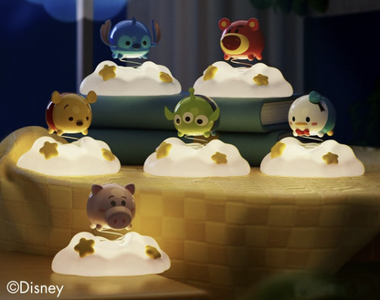Official Disney Tsum Tsum Cloud Night Light collection featuring Stitch, Lotso, Winnie the Pooh, Hamm, Donald Duck and Toy Story Alien, displayed with their glowing clouds illuminated.