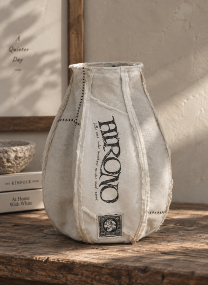 Pop Mart HIRONO Whisper Within Inner Fortress fabric vase with distressed cream textile outer and HIRONO character artwork